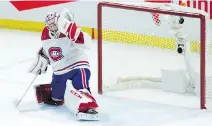  ?? ADRIAN WYLD/THE CANADIAN PRESS ?? Carey Price tries unsuccessf­ully to stop Mark Stone’s OT winner Saturday during the Habs’ 4-3 loss in Ottawa.