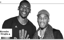  ??  ?? Bismack Biyombo and Didier Drogba