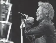  ?? CHARLES SYKES/ INVISION/ AP ?? Jon Bon Jovi performed “Do What You Can” in April at a fundraiser.