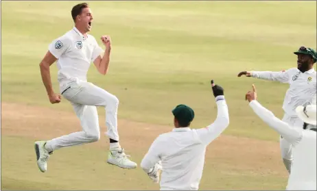  ?? Picture:REUTERS ?? TRY FILLING THESE BIG BOOTS: Morne Morkel celebrates taking the wicket of Australia’s Pat Cummins at Newlands this past weekend.