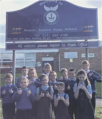  ?? ?? Children at South Hylton Primary Academy give the thumbs up to their recent good judgement by Ofsted.