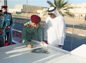  ?? — Supplied photo ?? The Ajman Police, led by Maj-Gen Sheikh Sultan bin Abdullah Al Nuaimi, write the biggest letter of loyalty to the UAE’s founding father as part of their Year of Zayed projects.