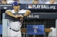  ?? DAVID J. PHILLIP — THE ASSOCIATED PRESS ?? Dodgers manager Dave Roberts watches during the fifth inning of Game 2 of World Series against Astros.