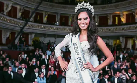  ??  ?? Queen with a cause: Lozano smiling after winning Miss Peru 2017 at the Lima Municipal Theatre. She suggests a database naming aggressors against women to better protect themselves.