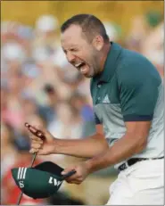  ?? MATT SLOCUM — THE ASSOCIATED PRESS ?? Sergio Garcia, of Spain, reacts after making his birdie putt on the 18th green to win the Masters golf tournament after a playoff Sunday in Augusta, Ga.