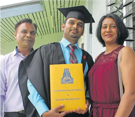  ?? Photo: Simione Haravanua ?? From left: Proud father Rajeshwar Prasad, Neville Prasad and mother Anjee Prasad after the Sangam College of Nursing and Health Care Education graduation in Suva on November 9, 2018.