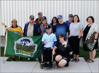  ?? Photos by Matthew Liebenberg/Prairie Post ?? Handcyclis­t Brent Worrall and his wife Gisela with supporters before his departure from the Ted Knight Saskatchew­an Hockey Hall of Fame in Swift Current, Sept. 7.