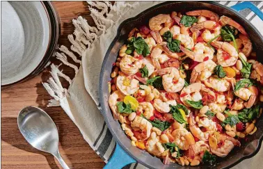  ?? TOM MCCORKLE FOR THE WASHINGTON POST ?? Shrimp with white beans, garlic and Calabrian chile.
