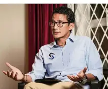  ??  ?? Olive branch: Sandiaga speaking to reporters in Jakarta. Prabowo’s vicepresid­ential choice said the ‘interest of the country is first and foremost’. — Bloomberg