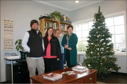  ?? Photos by Severo Avila / Rome News-Tribune ?? Brian Harris, Devon Smyth, Linda Blackwell and Melissa Wood are some of the staff members at the William S. Davies Homeless shelter. The staff as well as community volunteers and donors will make sure that shelter residents have special meals for...