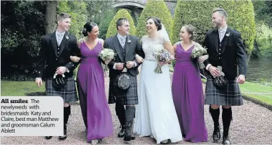  ??  ?? All smiles The newlyweds with bridesmaid­s Katy and Claire, best man Matthew and groomsman Calum Ablett
