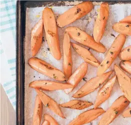  ?? DAVIDBAGOS­Y/TNS ?? Roasting is an easyway to get sweet, tender carrots.