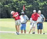  ?? STAFF PHOTO BY PATRICK MACCOON ?? Beck Lewis hits with his driver during match play against CAK on Monday.