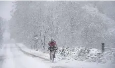  ?? ?? A cyclist on Countesswe­lls Road, near Foggieton Woods.