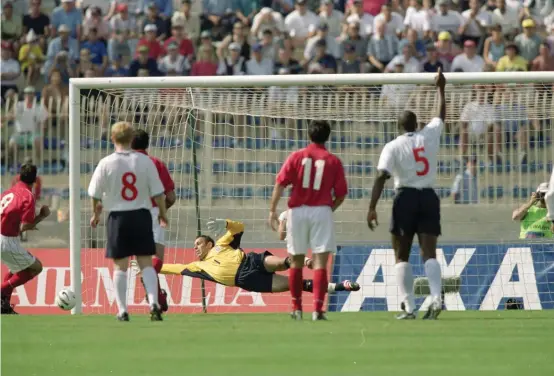  ??  ?? 3 June 2000: Scoring the famous penalty against mighty England