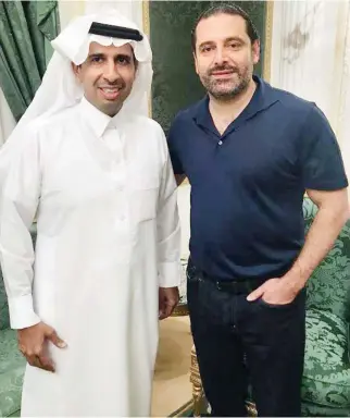  ??  ?? This photo from Lebanese Prime Minister Saad Al-Hariri’s Twitter account shows him with Saudi ambassador to Lebanon Waleed Yakoob. ‘It was a pleasure meeting Ambassador Waleed Yakoob after his swearing in before King Salman in Riyadh on Sunday,’ said...