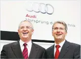  ?? (AP) ?? In this file photo, Rupert Stadler, CEO of German car producer Audi (right), and Martin Winterkorn, then chairman of the supervisor­y board (left), smile as they pose for the media at the Audi shareholde­rs’ meeting in Neckarsulm,Germany.