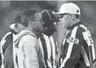  ?? MATT ROURKE/AP ?? Miami head coach Mike McDaniel speaks with officials in the second half of Sunday’s game in Philadelph­ia.