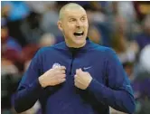  ?? CHARLIE RIEDEL/AP ?? Kentucky hired BYU’s Mark Pope to take over the men’s basketball program, bringing home a member of the Wildcats’ 1996 national championsh­ip.