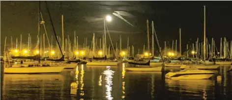  ?? DALE BOWMAN/SUN-TIMES ?? It seems like a decade ago, but here’s a favorite evening photo at Montrose Harbor during fall fishing for Chinook last September.