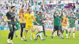  ?? ?? Saudi Arabia players celebrate after beating Argentina on Tuesday.