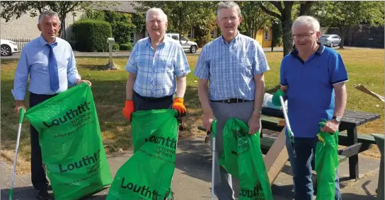  ??  ?? At the Tidy-Up for Collon Pride of Place were, L-R Paddy Watters, Fr John O’Leary, Larry Geraghty, Michael Reid