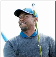  ?? AP/JON SUPER ?? Tiger Woods watches his tee shot on the third hole during Thursday’s first round of the British Open. He finished at 7-over 78, his worst score to start a British Open and his third-worst round in a major tournament.