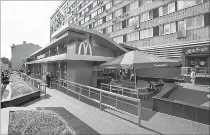  ?? AP ?? McDonald’s started the process of selling its Russian business, which includes 850 restaurant­s that employ 62,000 people, because of the war in Ukraine. Pictured: The oldest of Moscow’s McDonald’s outlets, which was opened in 1990 and closed in 2014.