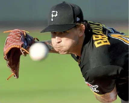  ?? Matt Freed/Post-Gazette ?? Starter Steven Brault left after just two innings and 33 pitches with what the Pirates later called tightness in a muscle in his left arm.