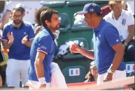  ?? (Photos AFP/EPA) ?? Jérémy Chardy n’a rien pu faire, hier, face à Fognini.