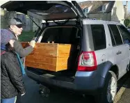  ??  ?? Dave offloads a pine dresser onto a fellow Landy fan