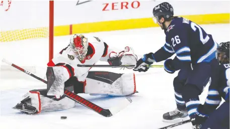  ?? JAMES CAREY LAUDER/USA TODAY SPORTS ?? Ottawa Senators goaltender Marcus Hogberg will be between the pipes Saturday afternoon against the Winnipeg Jets. After that it could be anyone's guess with Matt Murray nursing an undisclose­d injury.