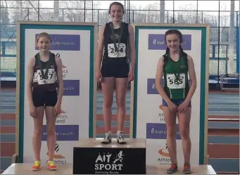  ??  ?? Dunleer’s Erinn Leavy on top of the podium.