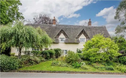  ?? ?? Grade Ii-listed Thatches in Suffolk is the home of conservati­on architect John Hyett and dates from the 15th century. £650,000