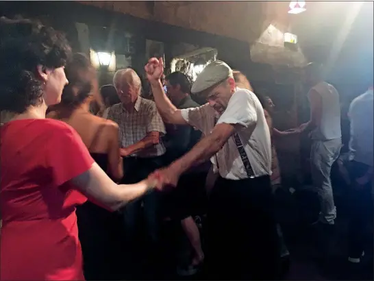  ?? [RUSSELL CONTRERAS/THE ASSOCIATED PRESS PHOTOS] ?? Swing dancers enjoy jazz at Caveau de la Huchette, a Paris jazz club that was a popular spot for African-American musicians in the 1950s.