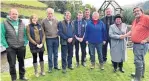  ??  ?? ● Edwin Jones welcomes Susan Elan Jones MP to his Tymawr farm, Carrog (right). With them were, from left, Euros Puw, Gwenno Davies, Arwyn Davies, Emyr Jones, Gareth Parry, Sion Ifans, Olwen Ford and Eifion Huws