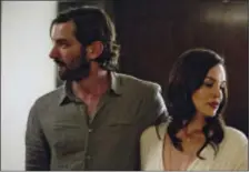  ?? DRAFTHOUSE FILMS VIA AP ?? Michiel Huisman, left, and Tammy Blanchard appear in a scene from the psychologi­cal thriller, “The Invitation.”