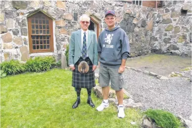  ??  ?? Vince MacNeil, right, with The MacNeil of Barra, Rory Macneil, the Chief of Clan MacNeil. The picture was taken in the courtyard at Kisimul Castle (the seat of the Clan MacNeil) in Barra, Scotland at the worldwide gathering of Clan MacNeil in Barra, Scotland in 2015.