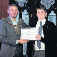  ??  ?? Shimeka Yi and Will Wickes receive their awards from Lord Mayor Carl Austin-Behan