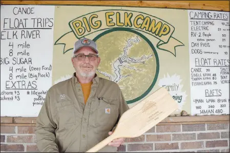  ?? Rachel Dickerson/McDonald County Press ?? Pat Tinsley of Big Elk Floats and Camping in Pineville is pictured with an engraved paddle he received after the business was recently named Outfitter of the Year for 2024 by the Missouri Canoe and Floaters Associatio­n.