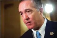  ?? AP PHOTO BY CLIFF OWEN ?? In this March 24 file photo, Rep. Trent Franks, R-ariz. speaks with a reporter on Capitol Hill in Washington.