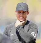  ?? David J. Phillip/Associated Press ?? New York Yankees’ Anthony Rizzo waits for the start of fielding drills during a spring training workout on Feb. 20 in Tampa, Fla.