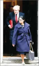  ?? DANIEL LEAL-OLIVAS/AFP ?? British Internatio­nal Developmen­t Secretary Priti Patel (front) and British Foreign Secretary Boris Johnson leave 10 Downing Street in central London in February.