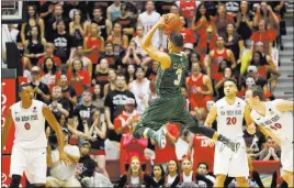  ?? LENNY IGNELZI/ THE ASSOCIATED PRESS ?? Colorado State guard Gian Clavell, shown against San Diego State in 2015, was averaging 20.8 points and 6.9 rebounds last season when he broke his hand.