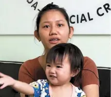  ??  ?? Difficult times: Wong is pleading to the public to help her raise funds to pay for her daughter Chloris’ medical bills after surgery to treat a hole in her heart.