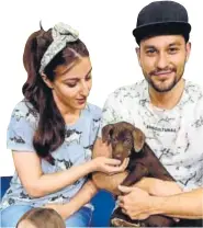  ??  ?? Actor Soha Ali Khan sports a pastel blue Tshirt with multiple prints of pugs. An ideal day wear, you can team it with a pair of denim or shorts