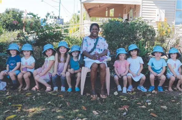  ?? ?? Girramay woman Marcia Jerry poses with Cardwell pre-schoolers, who provided an acknowledg­ment of country at the Bush Telegraph Museum in Cardwell.