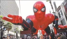  ?? Chris Delmas / AFP / Getty Images ?? A giant inflatable SpiderMan is displayed on the red carpet for the SpiderMan: Far From HomeWorld premiere on June 26 at the TCL Chinese theatre in Hollywood.