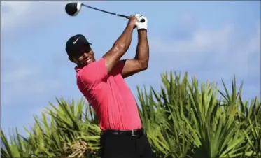  ?? ASSOCIATED PRESS FILE PHOTOS ?? How will Tiger Woods fare in his latest comeback? That is one of the big questions on the PGA Tour in 2018.