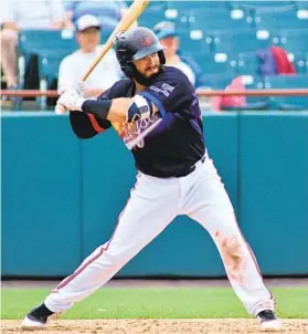  ?? COURTESY PHOTO ?? Orioles catching prospect Brett Cumberland takes a swing during a game with the Bowie Baysox in 2019.